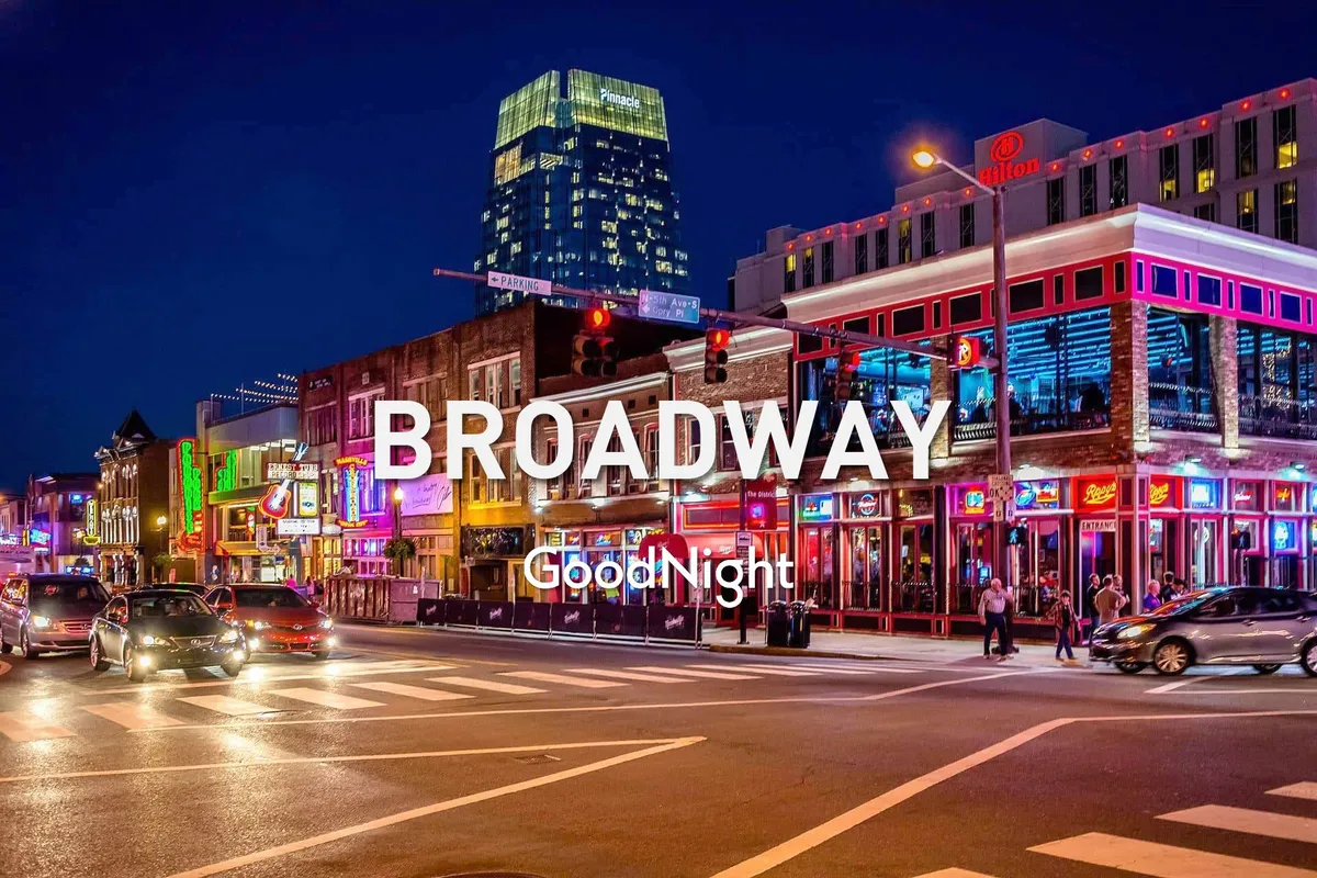 A lively Nashville street at night, illuminated by colorful neon lights and bustling with crowds of people enjoying the energetic nightlife. Tall buildings and bright signage capture the city's vibrant entertainment atmosphere.